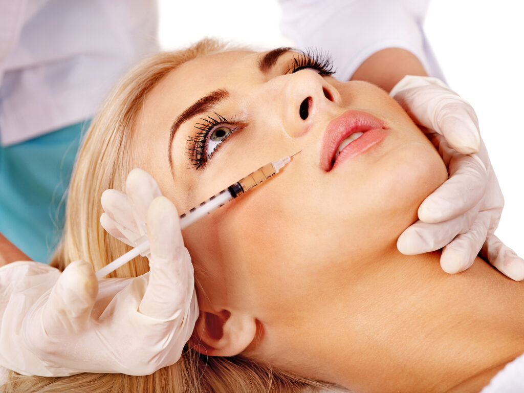 botox windsor - Doctor woman giving botox injections