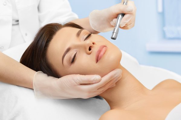laser hair removal windsor​ - woman at skin treatment procedure